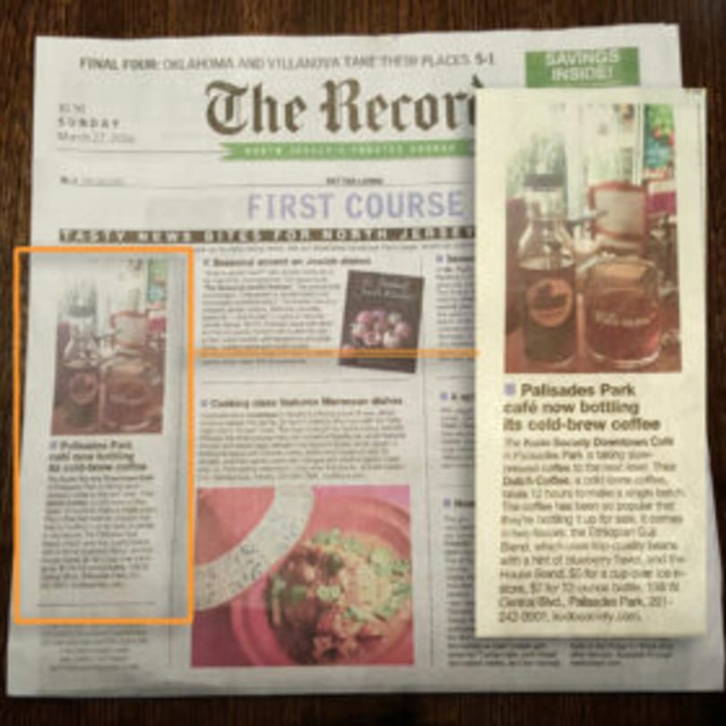 Newspaper article about Kudo Society's cold-brew coffee, with a photo of two bottled coffees.